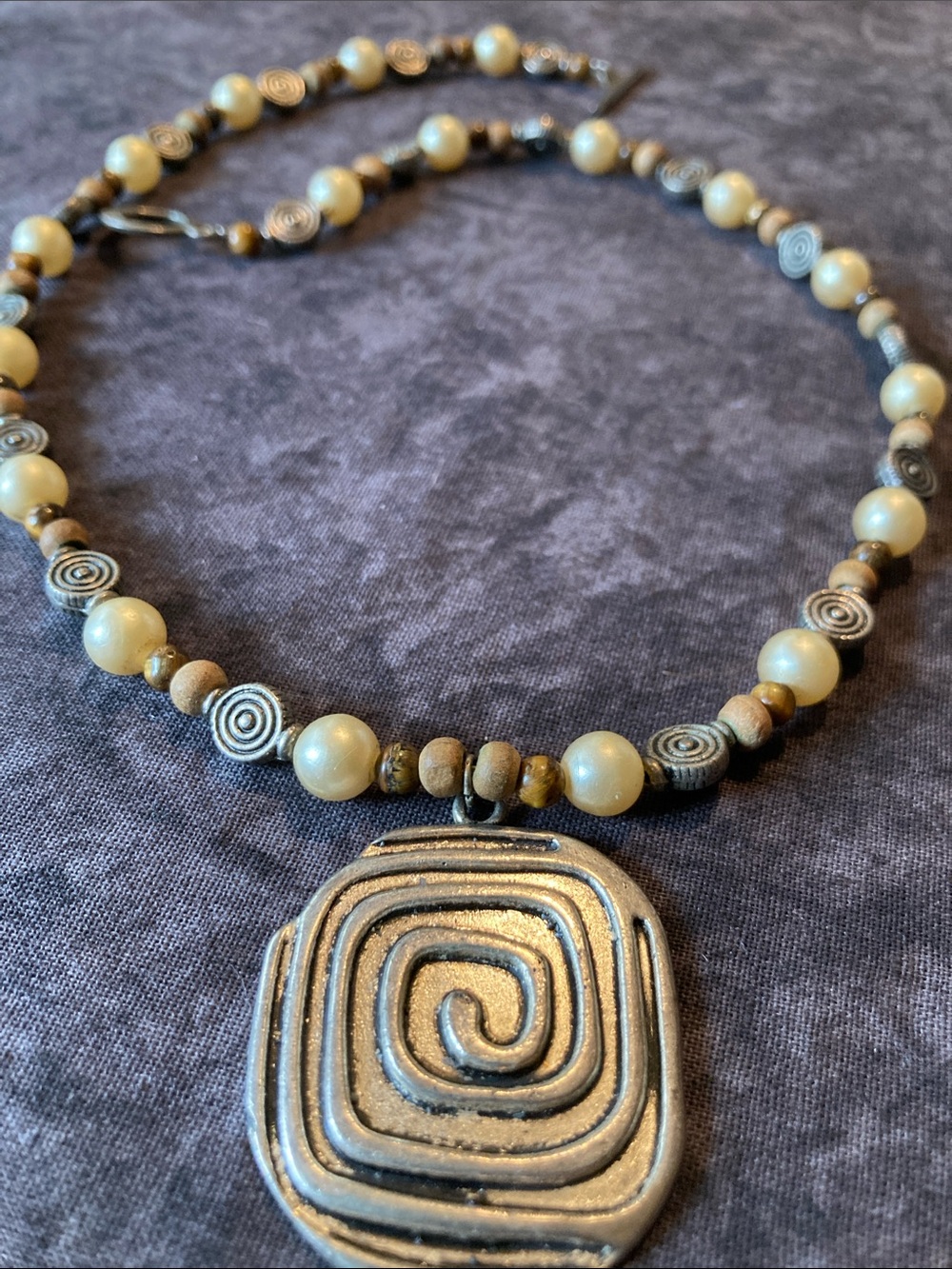 Handcrafted Silver-Tone Spiral Pendant Necklace in Cream and Wood Bead